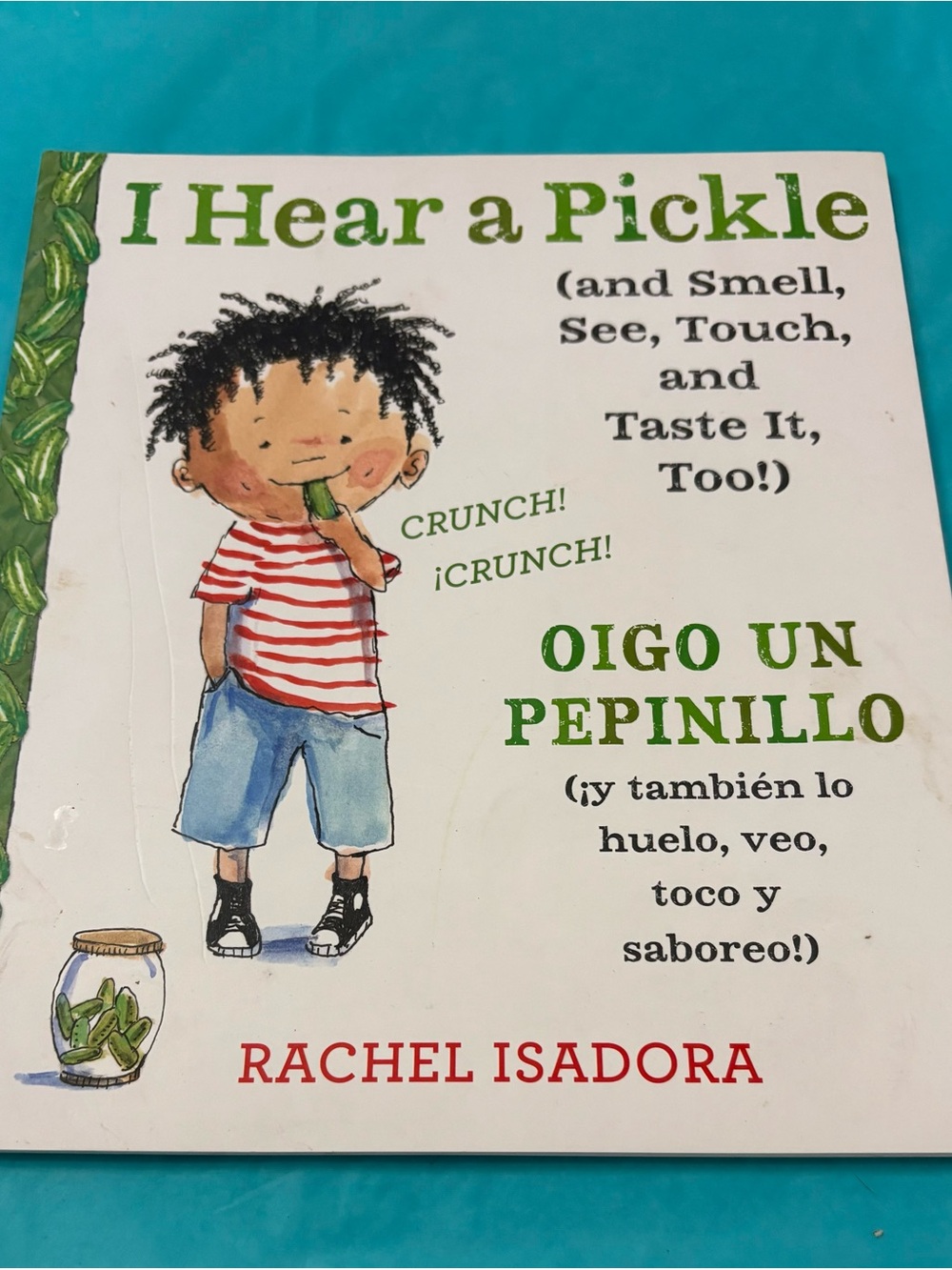 | Hear a Pickle Paperback Bilingual English/Spanish Isadora Illustrated
Ages 4-8